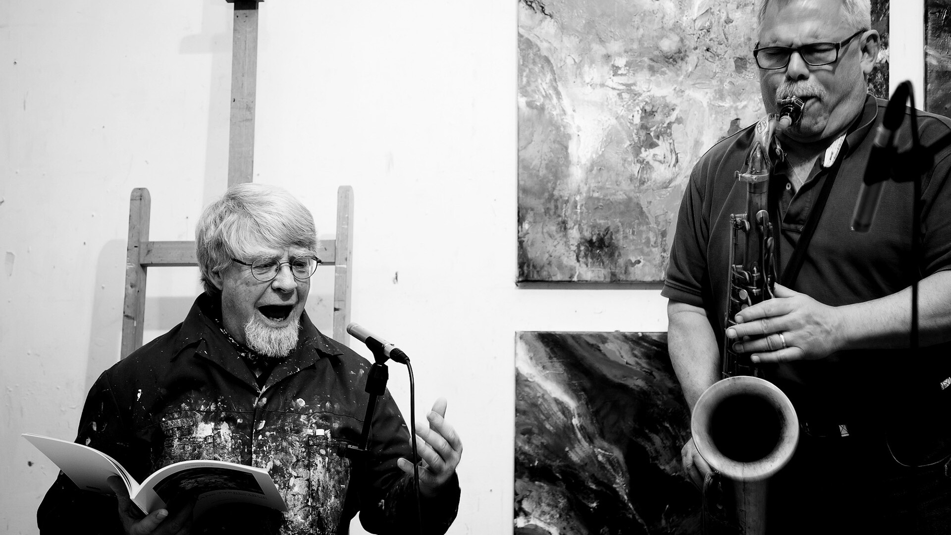 Picture of Marc Bernstien and Hans Tyrrestrup playing and reciting